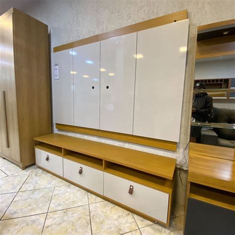 An Empty Room With Cabinets And Cupboards On The Wall Next To A Tiled