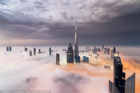 Burj Khalifa shown in stunning photos of Dubai above the clouds | Daily Mail Online