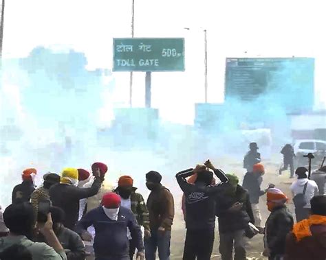 Farmers Begin March Towards Delhi Few Detained Near Shambu Border Police Hurl Tear Gas Shells