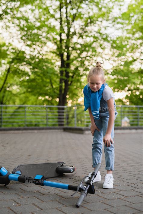 Electric Scooter Accident Girl Suffering Of Pain After Knee Injury