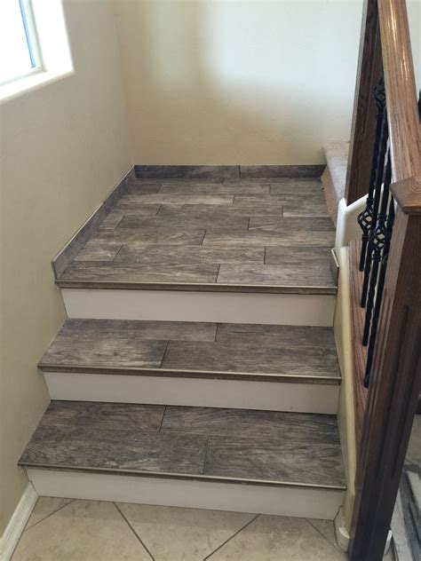 Porcelain wood look tile stairs | Flooring for stairs, Diy staircase ...