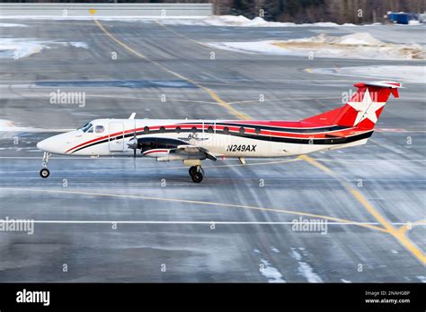 Alaska Central Express cargo plane Beech 1900 taxiing. ACE is a cargo ...