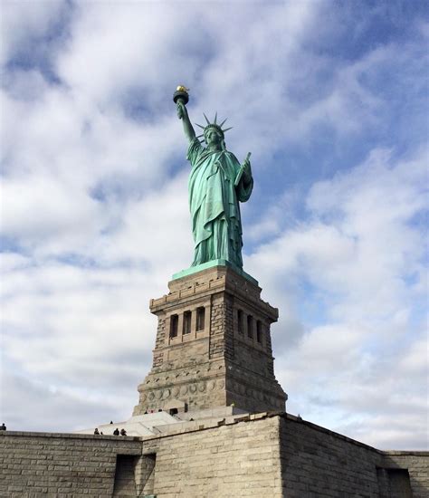 Statue of Liberty. The New Colossus. Not like the brazen giant of Greek ...