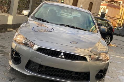 Lancer EX Shark Mitsubishi 2017 Sheikh Zayed City Silver 5380056 - Car for sale : Hatla2ee