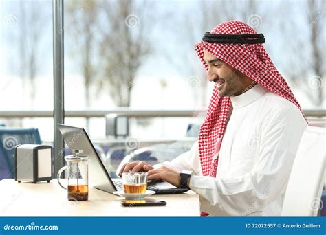 Arab Saudi Man Working Online With A Laptop Stock Image Image Of