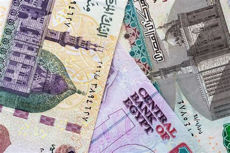 Premium Photo | Three egyptian pound banknotes closeup