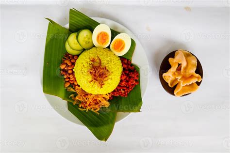 Nasi Kuning Or Yellow Rice Or Tumeric Rice Is Traditional Food From