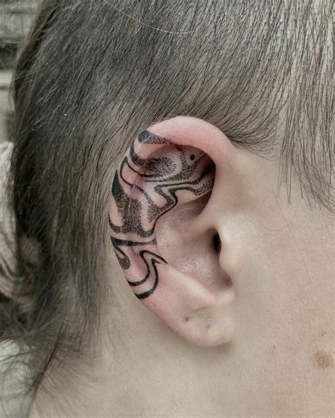 105 Ear Tattoo Ideas Youd Want To Consider Having Done Bored Panda