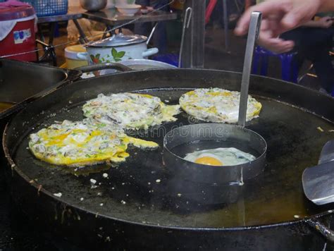 Appetizing Sizzling Oyster Omelette Hoy Tod Being Cooked On A Hot Pan