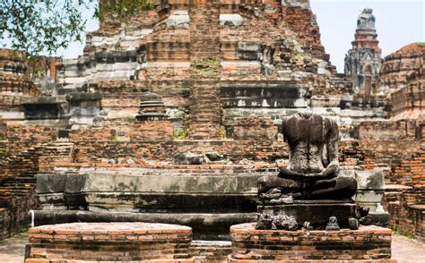 Old Buddha Statues And Pagodas Of Wat Phra Ram Ayutthaya Thailand It