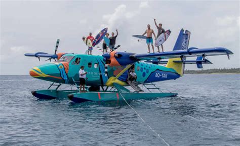 Surfing in Maldives: Four Seasons Resorts Maldives at Kuda Huraa ...