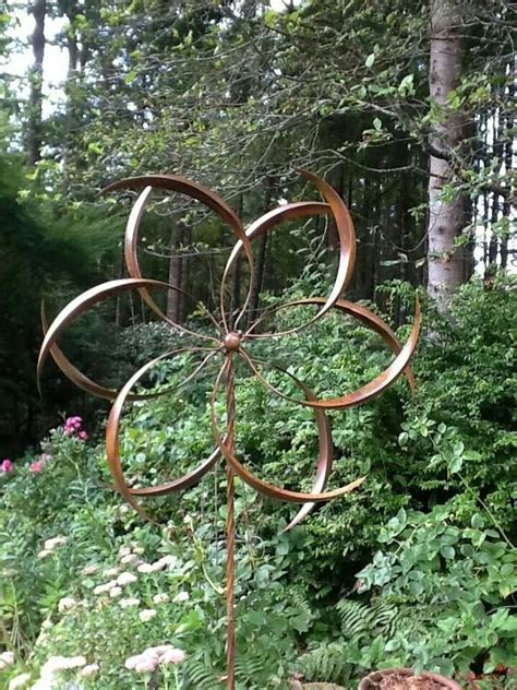 Wind sculpture | Wind sculptures, Garden arch, Landscape