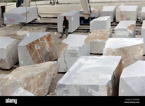 View On A Deposit Of White Marble Blocks Near A Quarry In Italian Stock