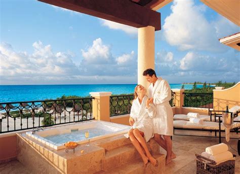 A Jacuzzi On The Private Balcony Of A Guest Suite At Secrets Capri Is