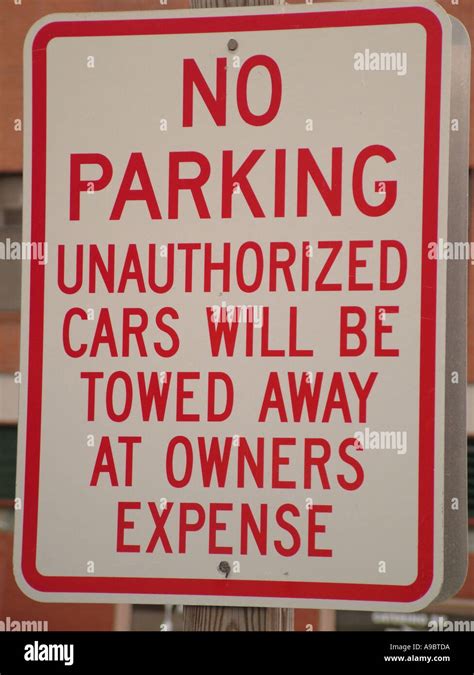 AJD42823, parking sign, No Parking, tow zone sign Stock Photo - Alamy