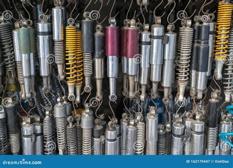 Many Old Shock Absorbers Hanging At A Repair Shop On Hanoi Street