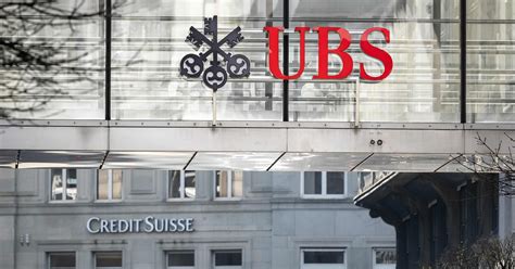 Ubs Shares Sink After Credit Suisse Buyout