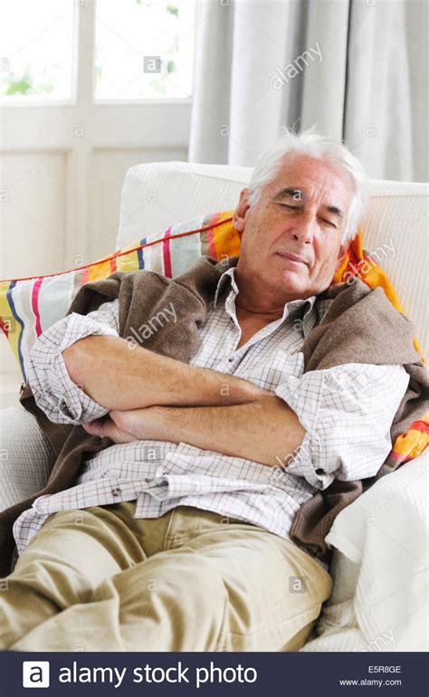 Senior Taking A Nap Stock Photo Alamy