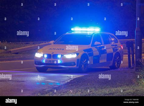 A Bmw Police Vehicle At The Scene Of A Road Traffic Collision In