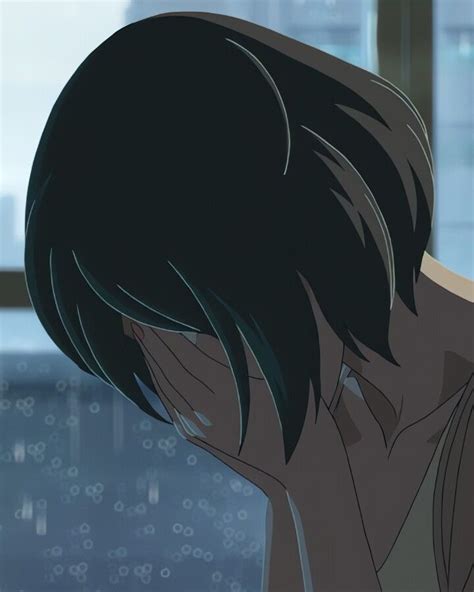 An Anime Girl With Black Hair Looking Out The Window