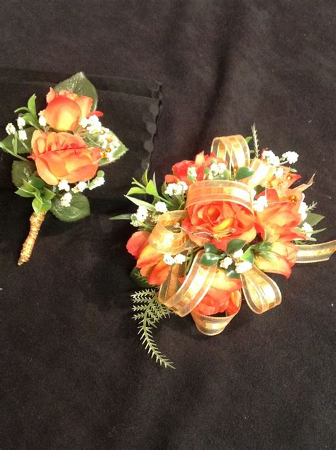 Coordinating set of a wrist corsage and a boutonnière that has it s