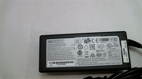 Genuine Original APD Dell Asian Power Devices AC Power Adapter NB 65B19