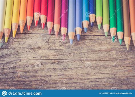 Creativity Multi Colored Pencils On Rustic Wooden Table Stock Photo