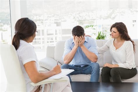 Premium Photo | Depressed couple talking with their therapist