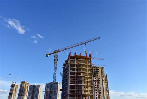 Preparing To Pour A Bucket Of Concrete Into Formworktower Crane