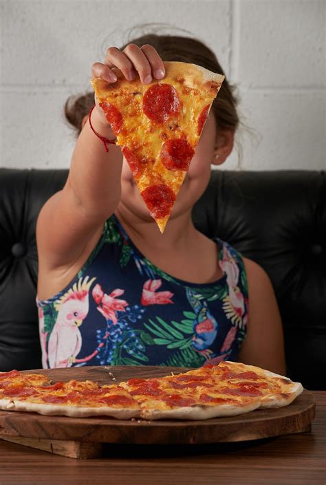 Pizza Slices on Pink BackgroundFree Stock Photo