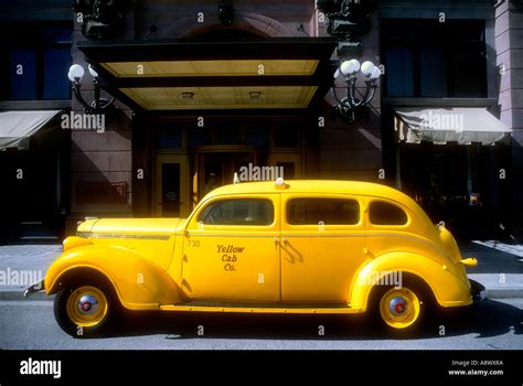 A New York Yellow Taxi Cab Circa 1940s Parked Outside A Replica Of