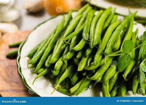 Fresh Green Snap Beans On The Plate Ready To Cook Stock Photo Image