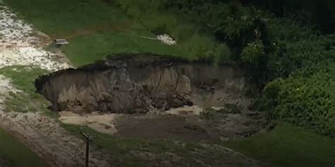 Massive sinkhole opens near Florida homes, closes roads | Fox Weather