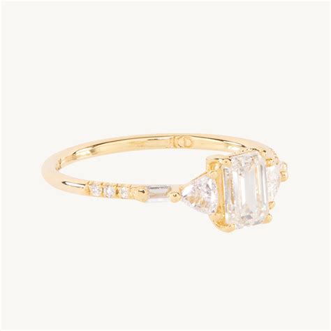 Equilibrium Emerald Cut Diamond Ring With Diamonds In K Gold Catbird