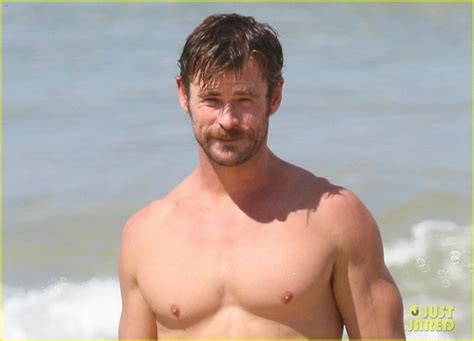 Chris Hemsworth Puts His Ripped Shirtless Body On Display As He Soaks