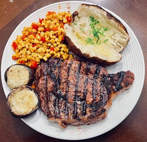 [homemade] Grilled Ribeye Smoked Baked Potato Southwestern Corn And Peppers And Cheese Stuffed