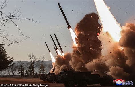 Leather Clad Kim Jong Un Fist Pumps The Air As He Oversees Super Large