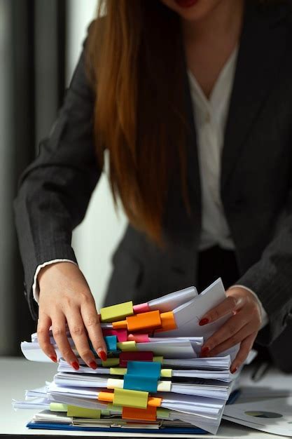 Premium Photo Businesswoman Hands Working In Stacks Of Paper Files