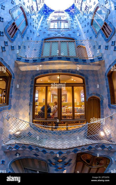 Inner courtyard of Casa Batlló decorated with a gradient mosaic from