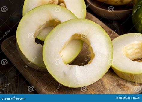 Cut Into Pieces Ripe Yellow Melon With Sweet Pulp Stock Photo Image