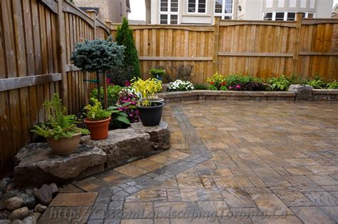 backyard interlocking project with flower beds - Toronto Landscaping ...