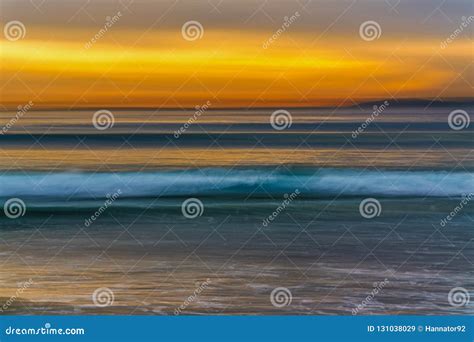 Sunset on the Beach, Ocean Waves and Yellow Sky Stock Image - Image of ...