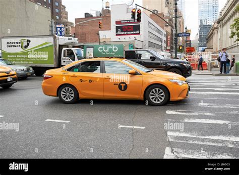 toyota camry New York City yellow cab USA Stock Photo - Alamy