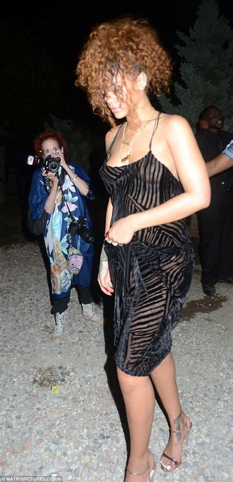 Rihanna Goes Braless In Semi Sheer Zebra Print Dress On Night Out