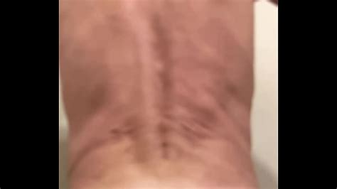 Slow Motion Muscle Roller Action Massage From Behind Nude And In Light