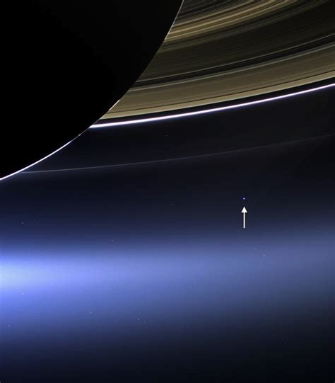 Smithsonian Magazine — The View of Earth from Saturn Floating in space...