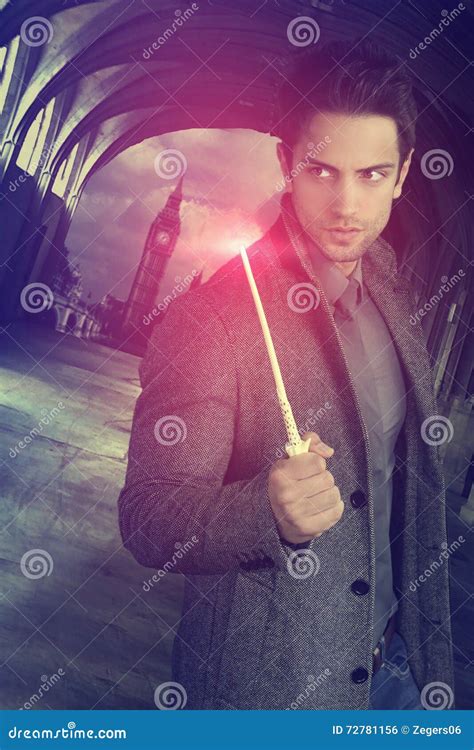 Handsome Wizard Holding A Magic Wand Stock Photo Image Of Male