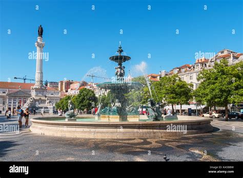 The Dom Pedro Iv Monument And Fountain At Rossio Square In The Central