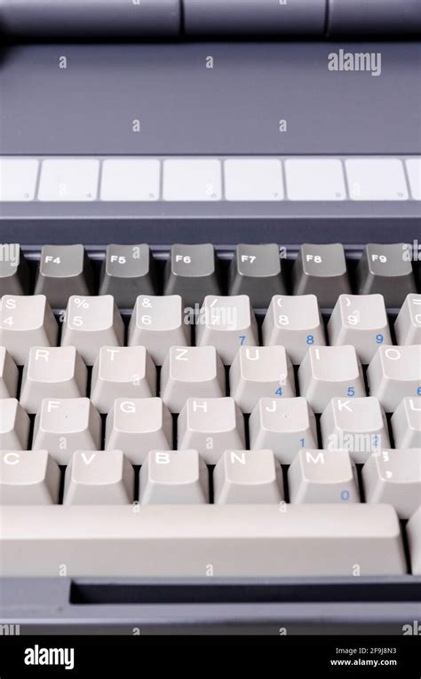 Keyboard With Different Grey Buttons Of An Old Fashioned Laptop Close