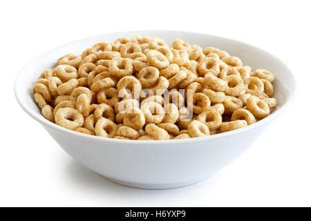 Bowl of honey cheerios isolated on white. Spilled cheerios Stock Photo, Royalty Free Image ...